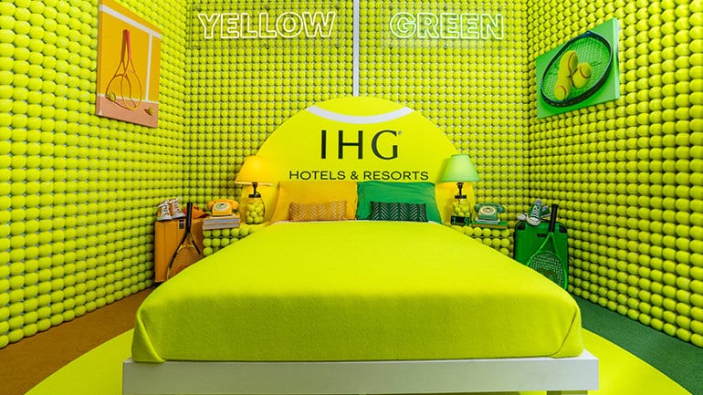 ihg rally room inspired by the divisive color of a tennis ball room 1